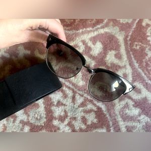 Prada sunglasses with case. Very good condition.
